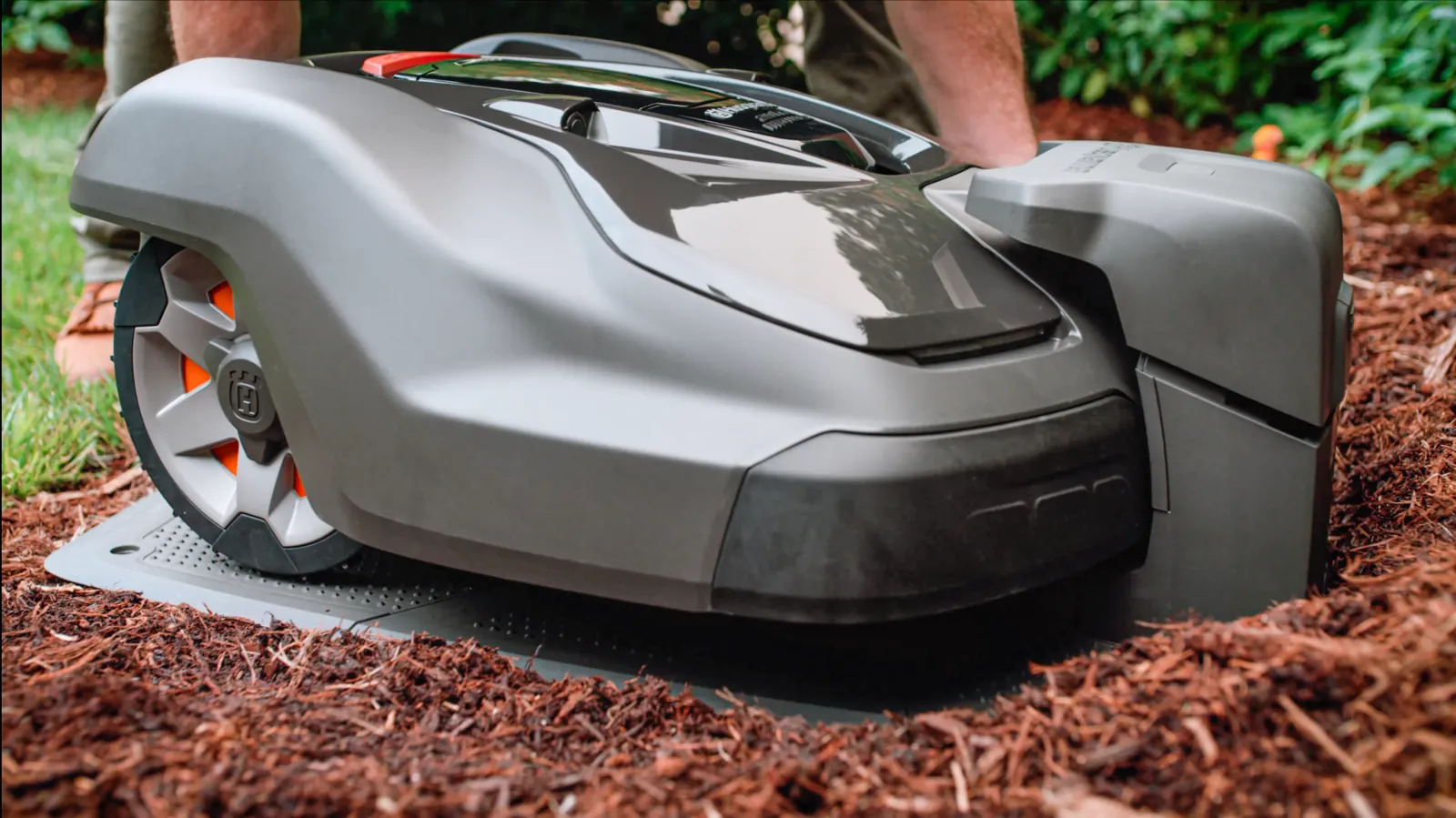 Husqvarna Automower® driving into its charging station